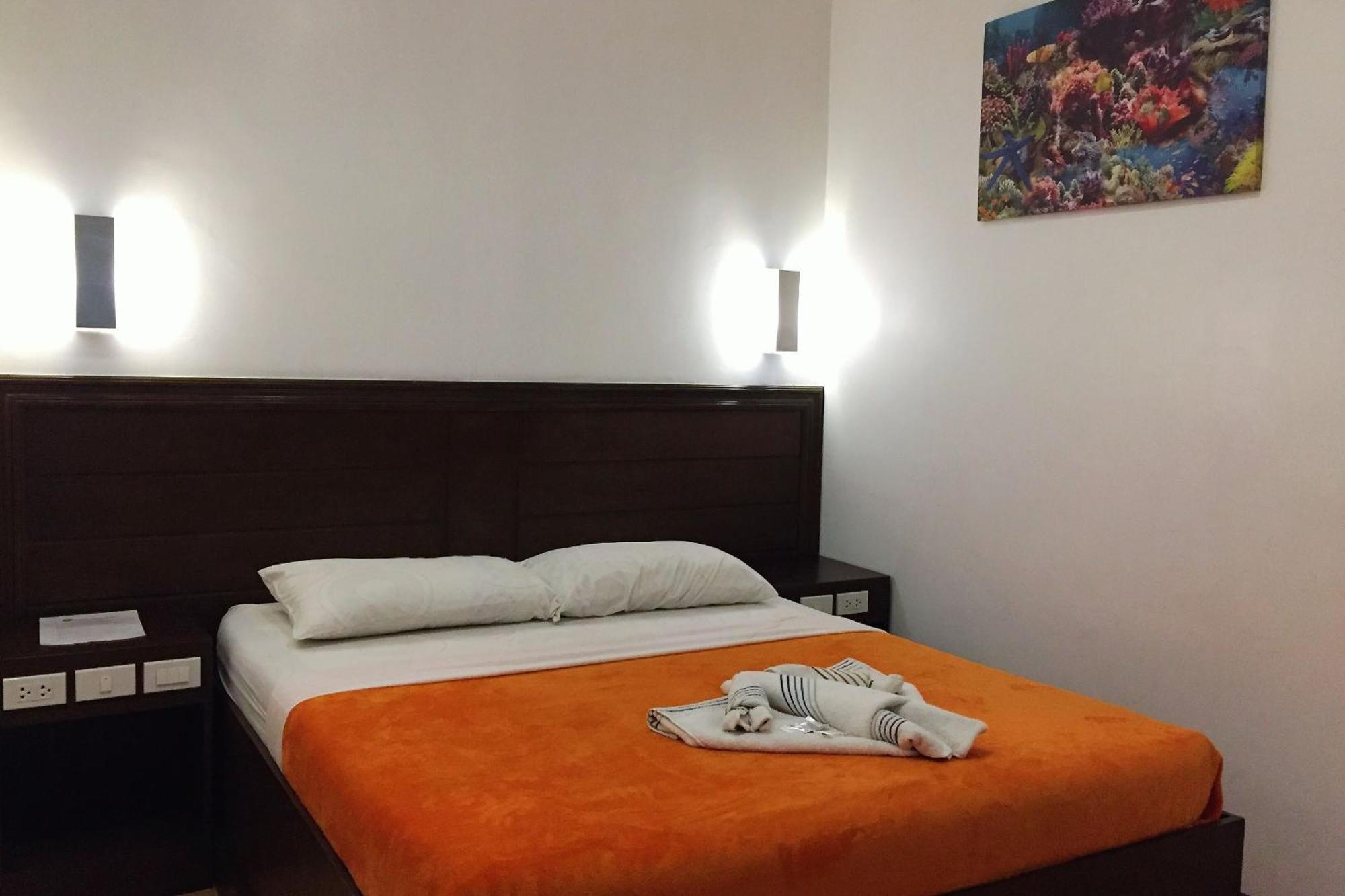 Pearli View Hotel Iloilo Powered By Cocotel Habitación foto