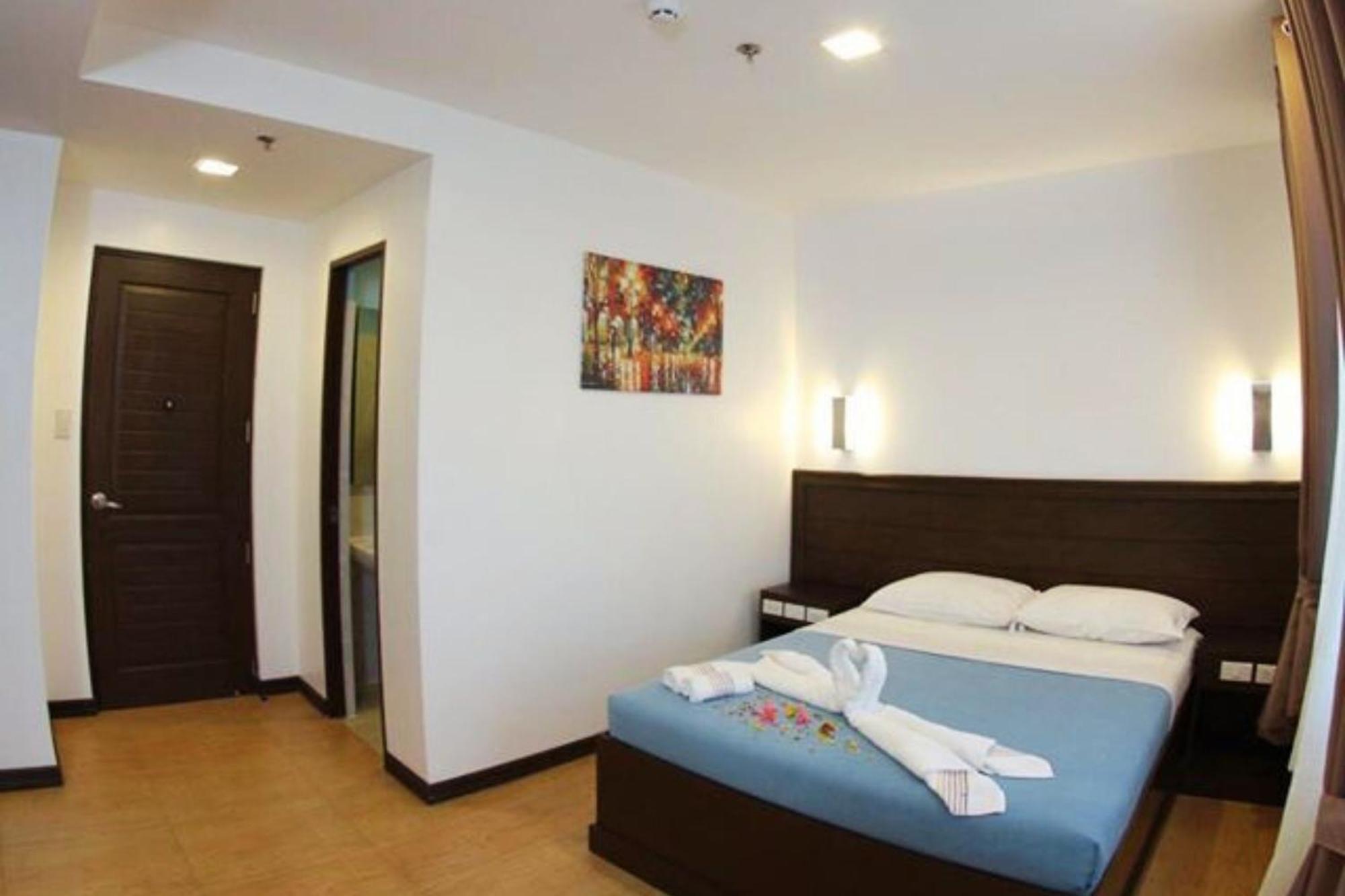 Pearli View Hotel Iloilo Powered By Cocotel Habitación foto